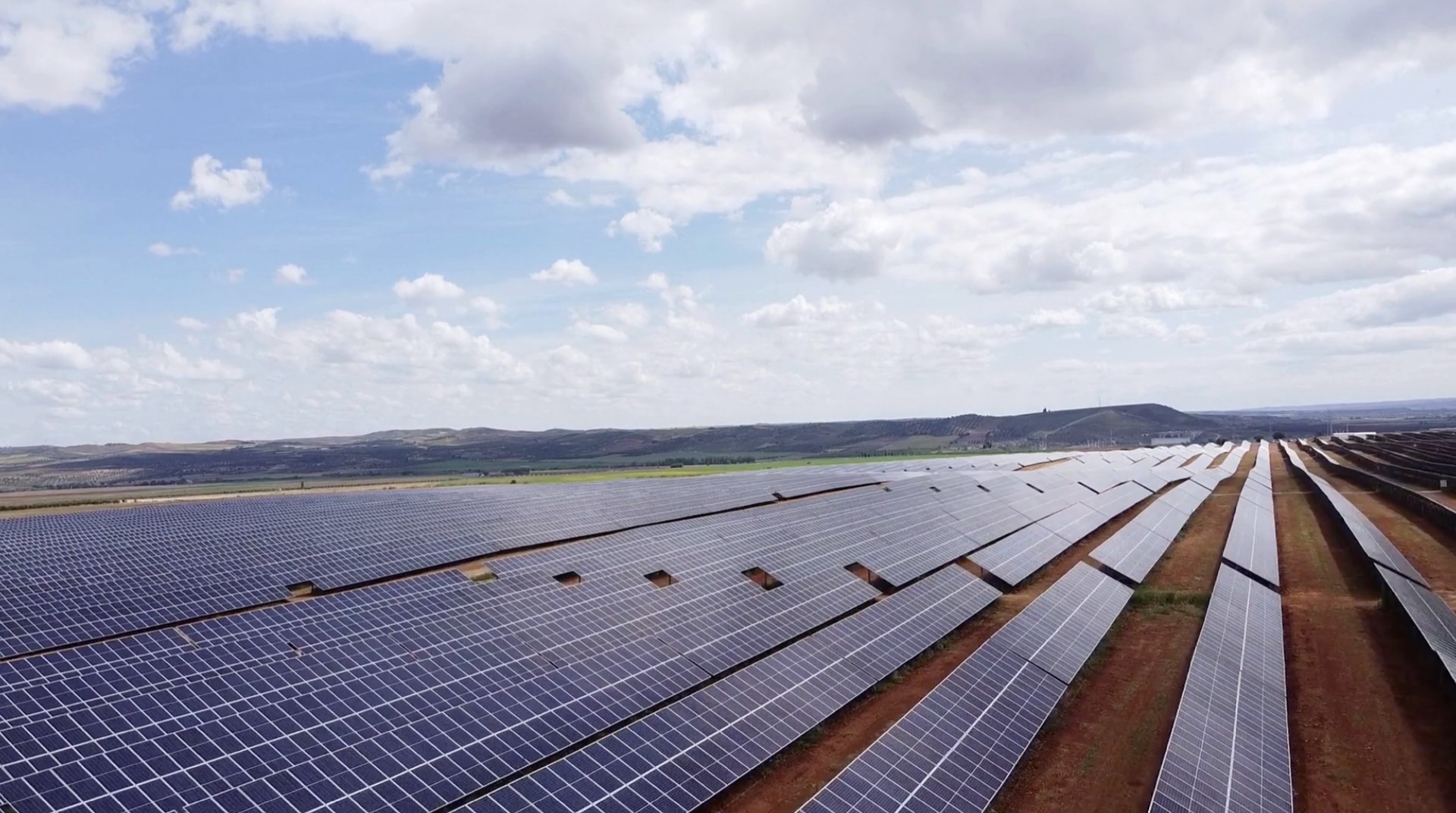 Utility-scale solar PV installation with rows of solar panels